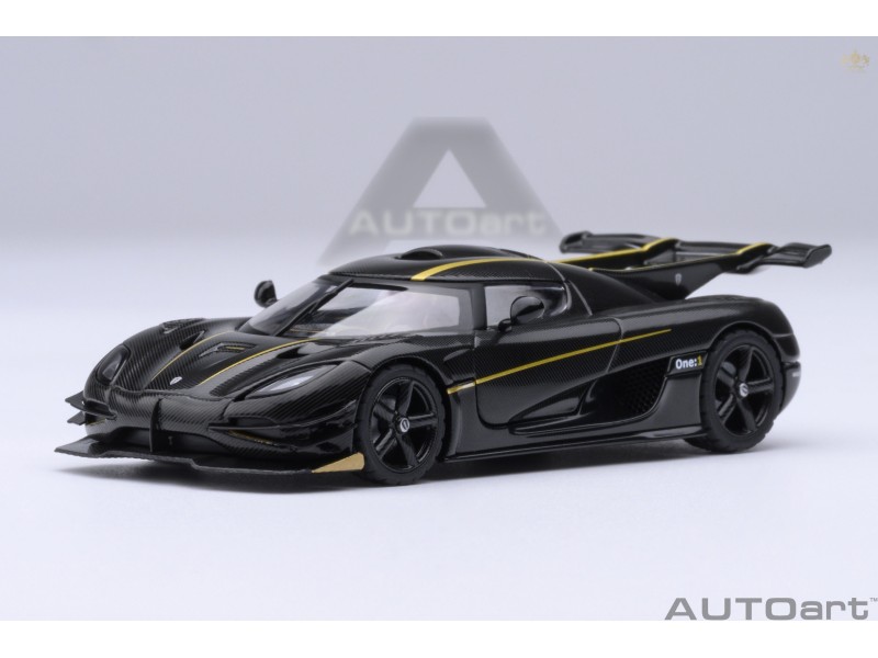 Koenigsegg One:1 1:64 clear carbon fiber/gold stripes - AUTOart