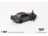 NISSAN SKYLINE GT-R (R32) NISMO NISMO GUNMETAL WITH TSUGIO MATSUDA 1992 -1:64 - Mini GT