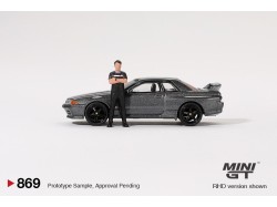 NISSAN SKYLINE GT-R (R32) NISMO NISMO GUNMETAL WITH TSUGIO MATSUDA 1992 -1:64 - Mini GT